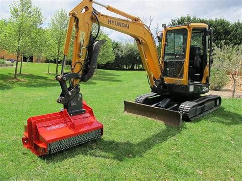 mini excavator mulcher attachment|mini excavator with mulching head.